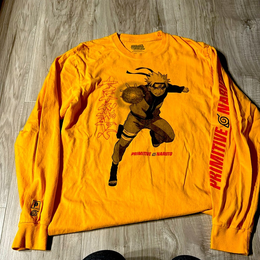 Men’s gold colored, long sleeve primitive T-shirt